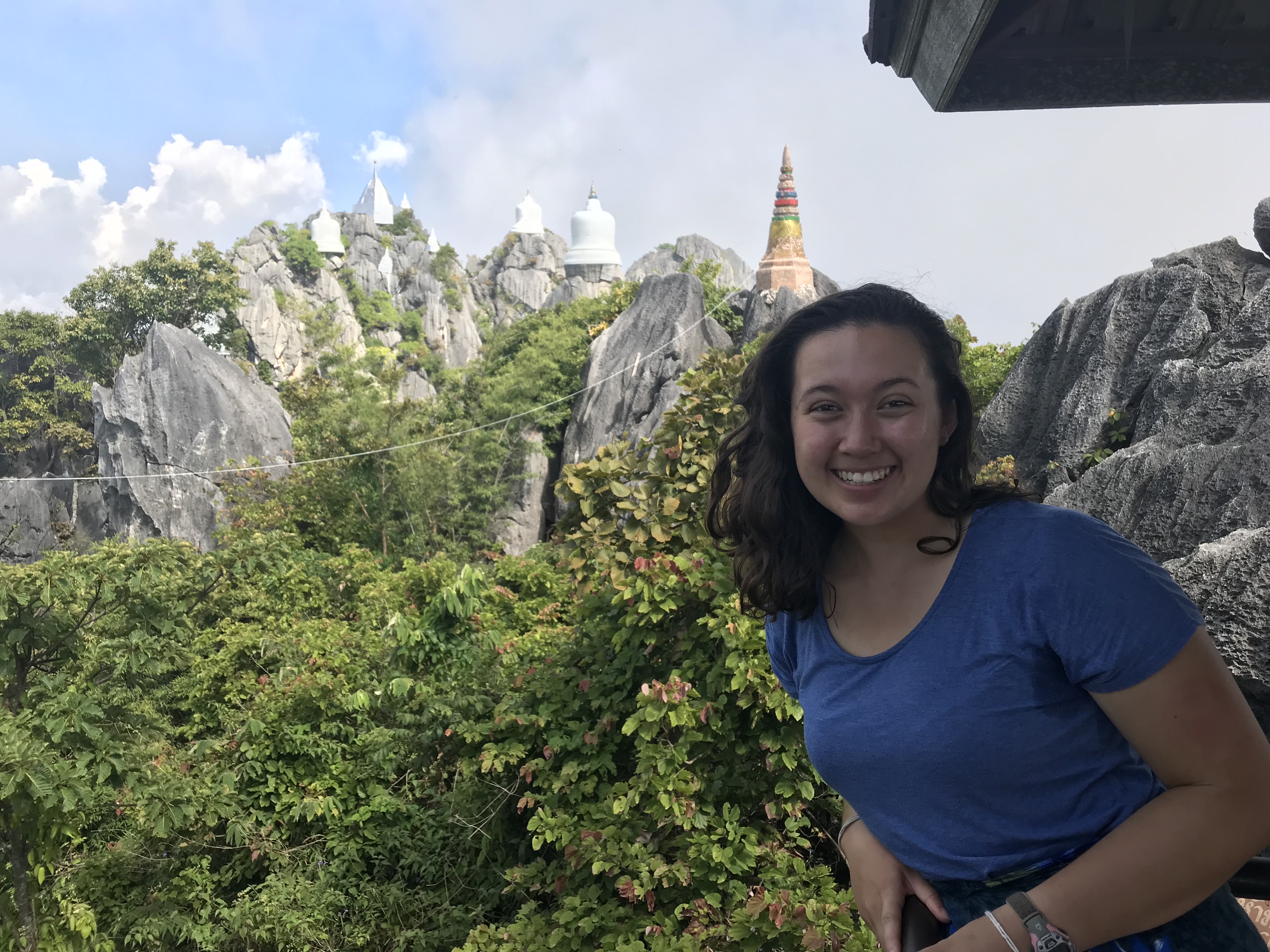 Holly in front of a hilltop temple in Lampang, Thailand